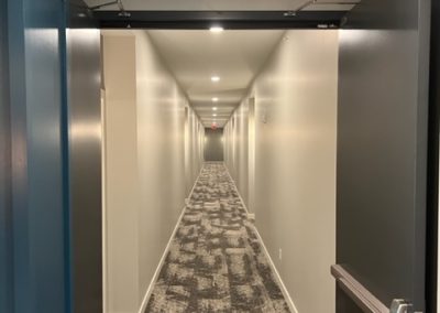 The carpeted hallways inside the luxury apartments building, the 85 at Midland Terrace