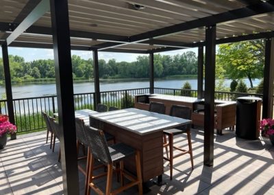 The outdoor patio and lake view at the 85 at Midland Terrace luxury apartments complex